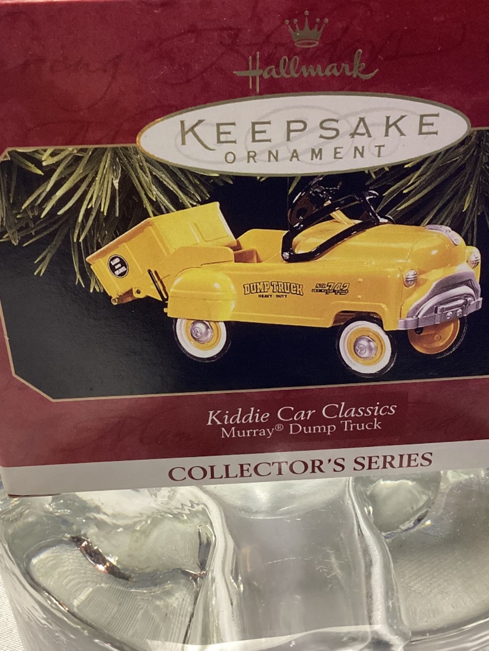 Keepsake ornament. HALLMARK. DUMP TRUCK YELLOW